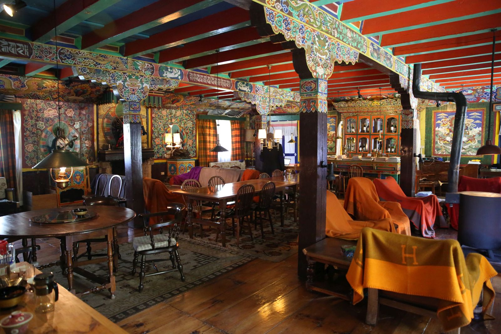 Colourful interior of the house, with tables and chairs