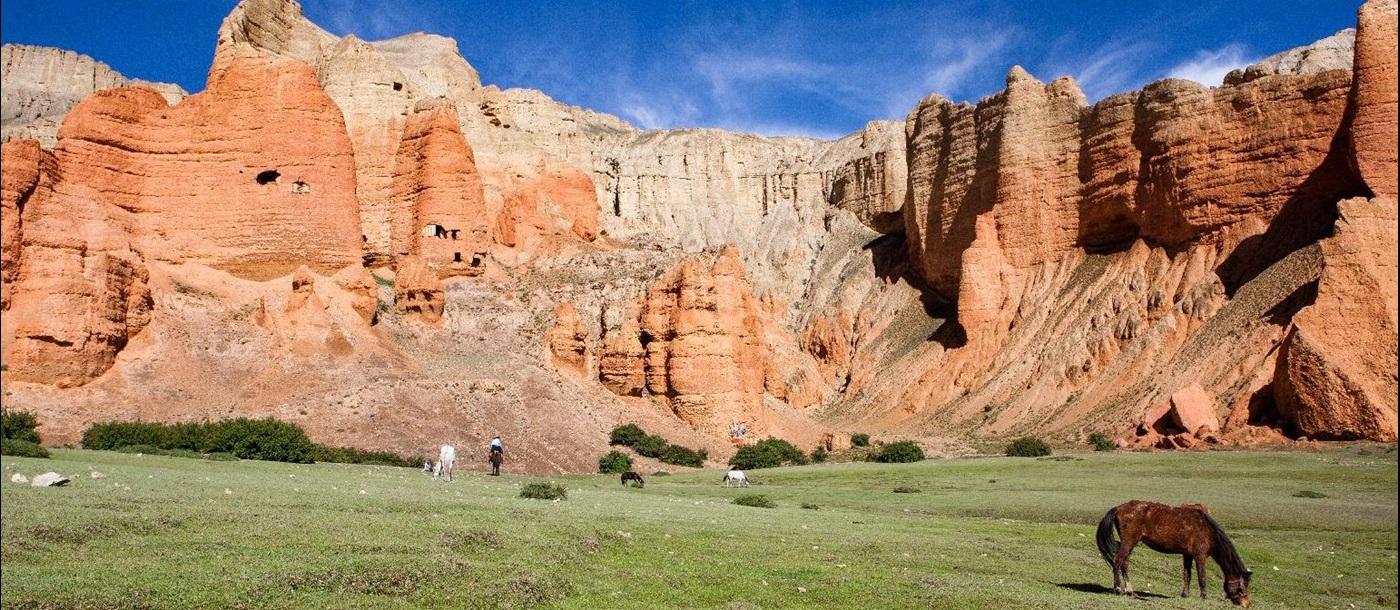 Rural scenery and orange cliffs in Mustang Nepal