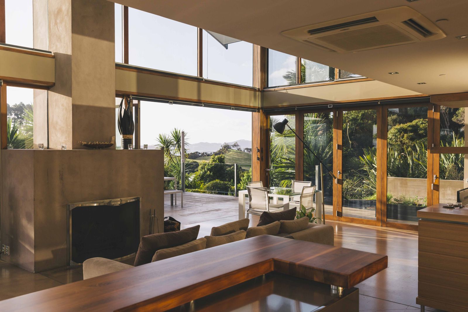 First Light Temple villa New Zealand interior with fireplace and living area