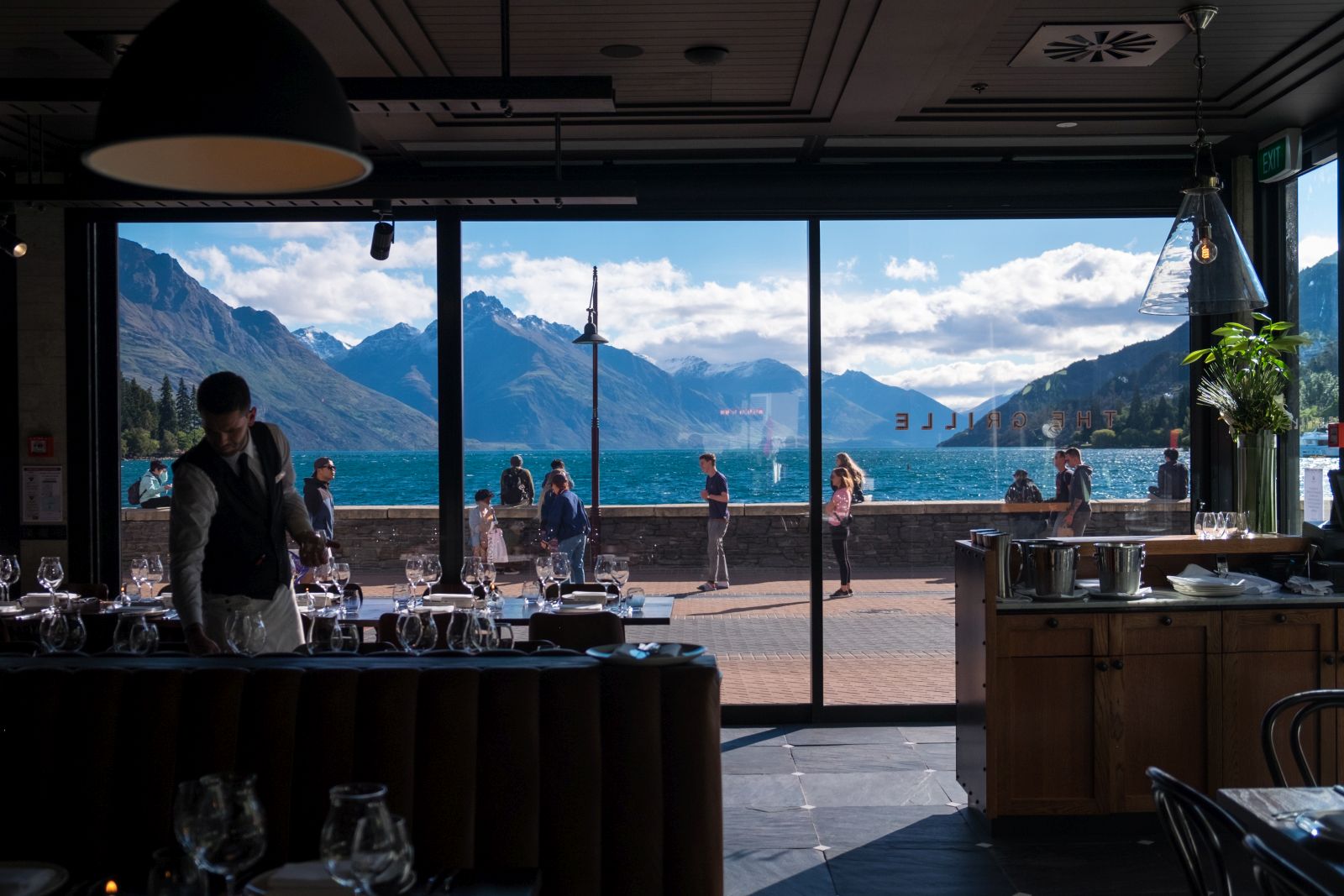 Eichardt's Private Hotel New Zealand restaurant with waiter setting the tables