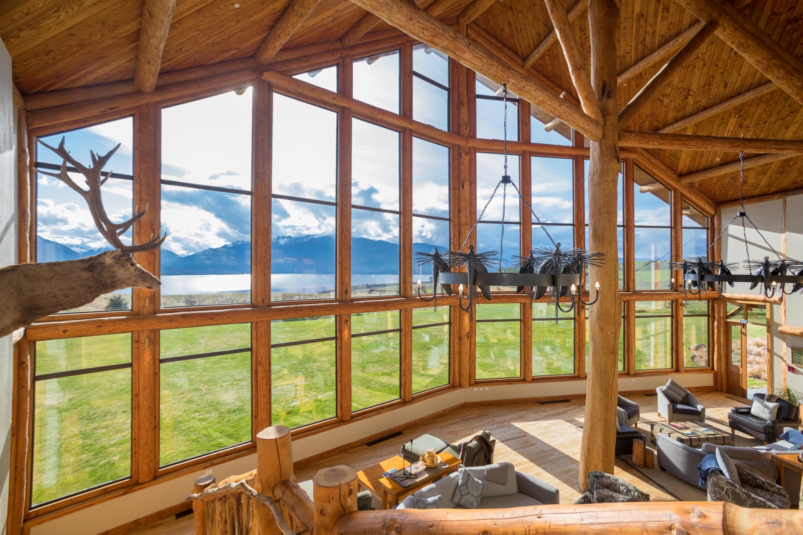 Great room with high beamed ceilings at Fiordland Lodge, New Zealand