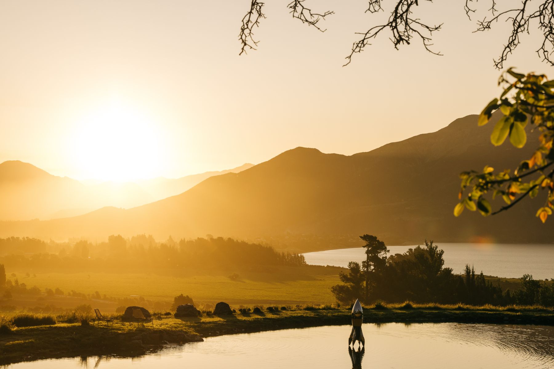 Sunset over the lake at Lake Hawea Station, a luxury lodge in New Zealand