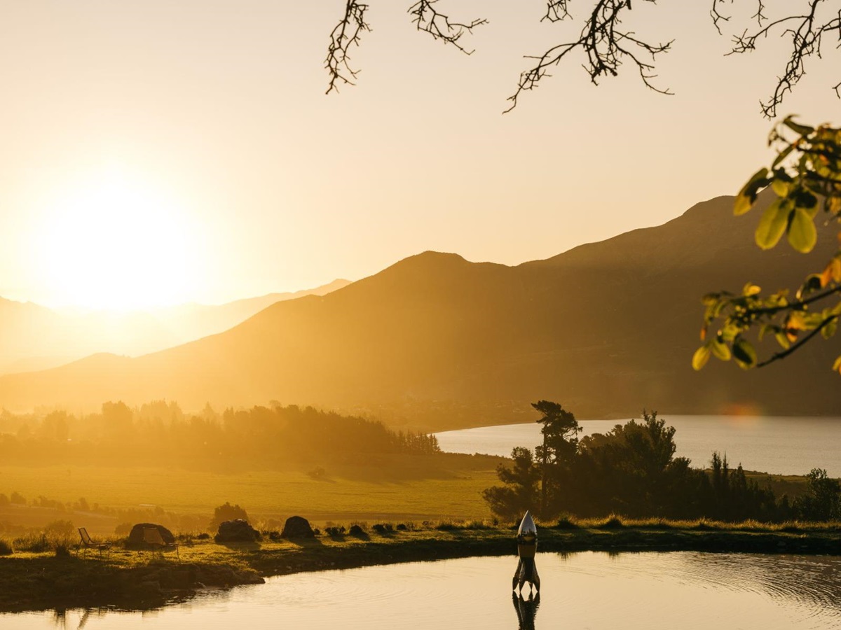 Sunset over the lake at Lake Hawea Station, a luxury lodge in New Zealand