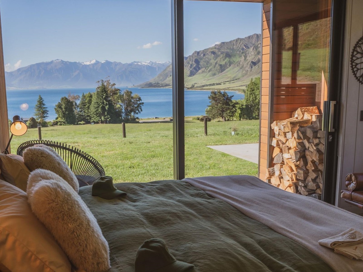 Lake and mountain views from a guest cottage at Lake Hawea Station, a luxury lodge in New Zealand