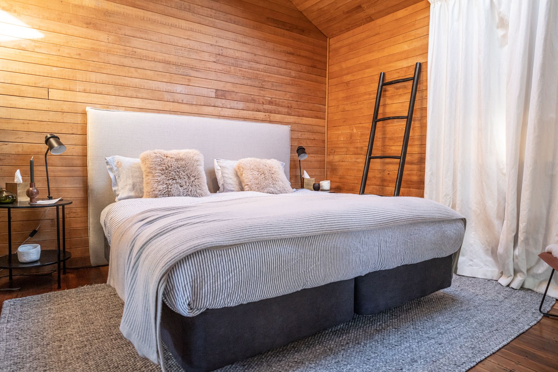 Interior of a guest room at Lake Hawea Station, a luxury lodge in New Zealand