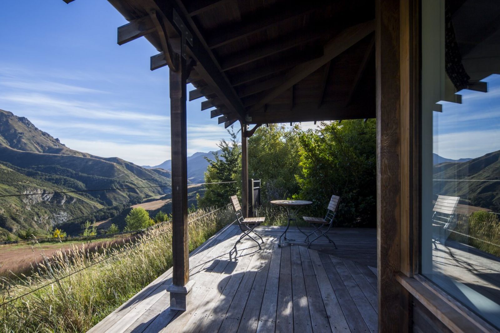Mountain view from the verandah of a suite at Mahu Whenua near Wanaka Lake, New Zealand