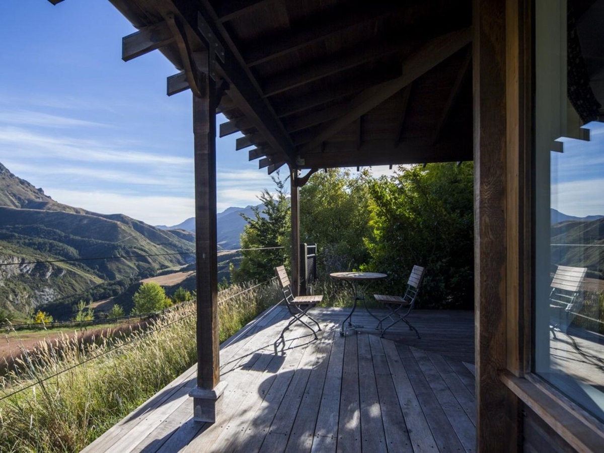 Mountain view from the verandah of a suite at Mahu Whenua near Wanaka Lake, New Zealand