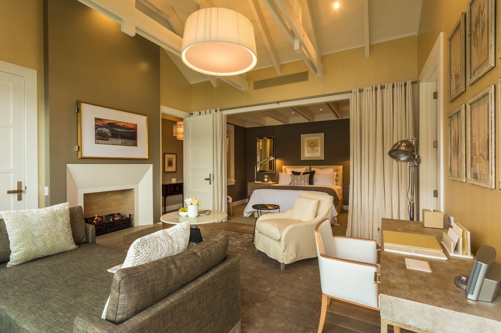 Spacious open plan Owners Cottage bedroom and living space at Matakauri Lodge New Zealand