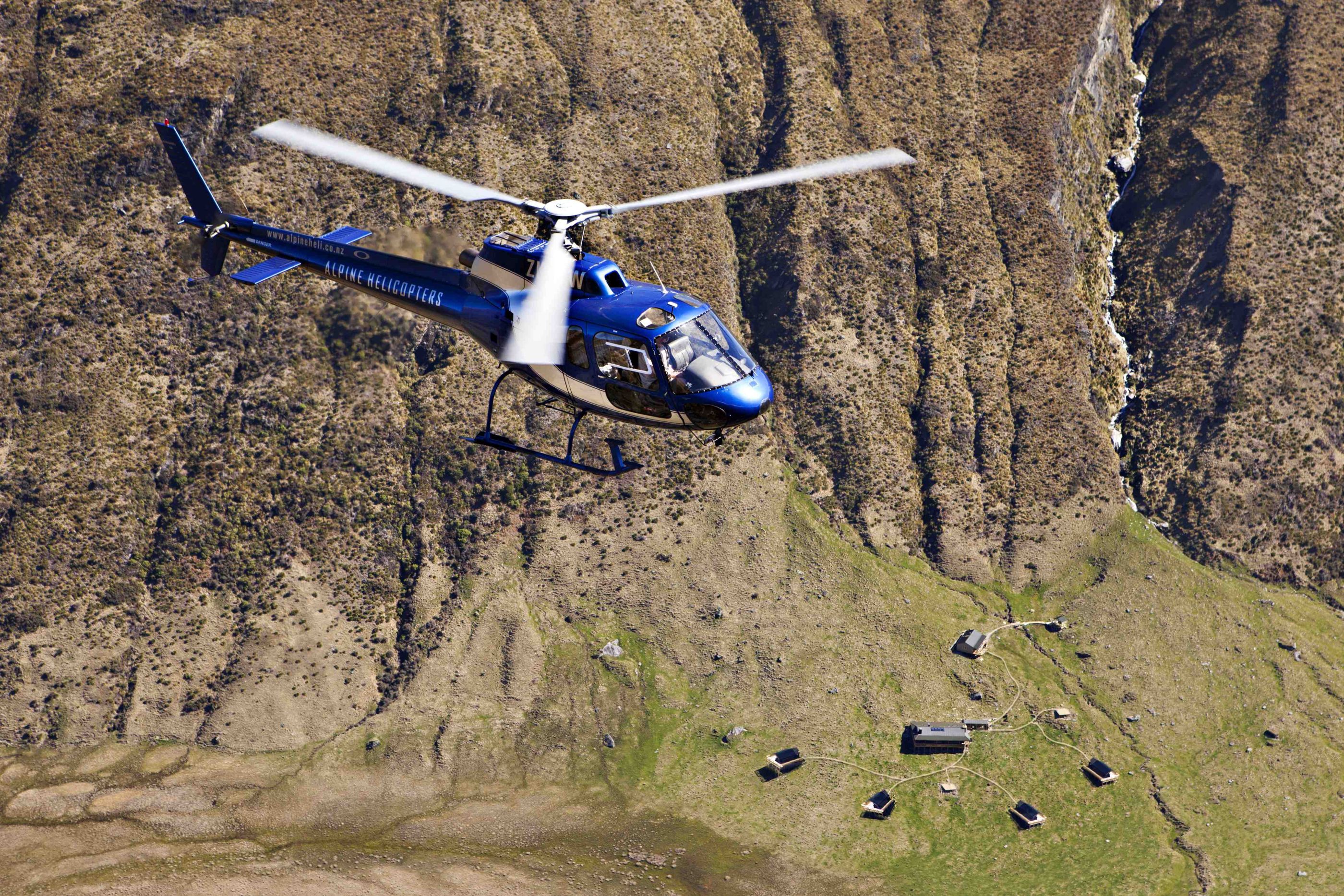 A helicopter over Minaret Station in New Zealand