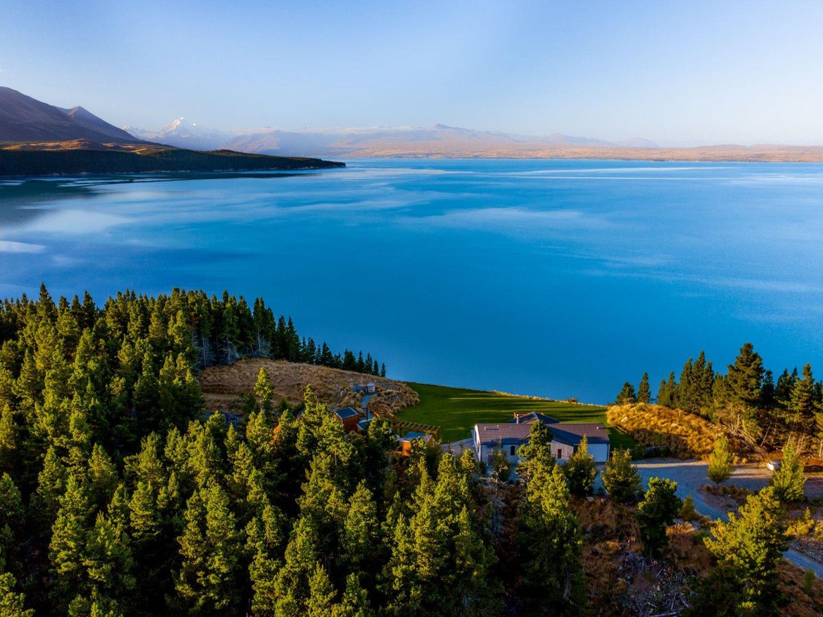An aerial view of Lake Pukaki at Mt Cook Lakeside Retreat, a luxury lodge in New Zealand