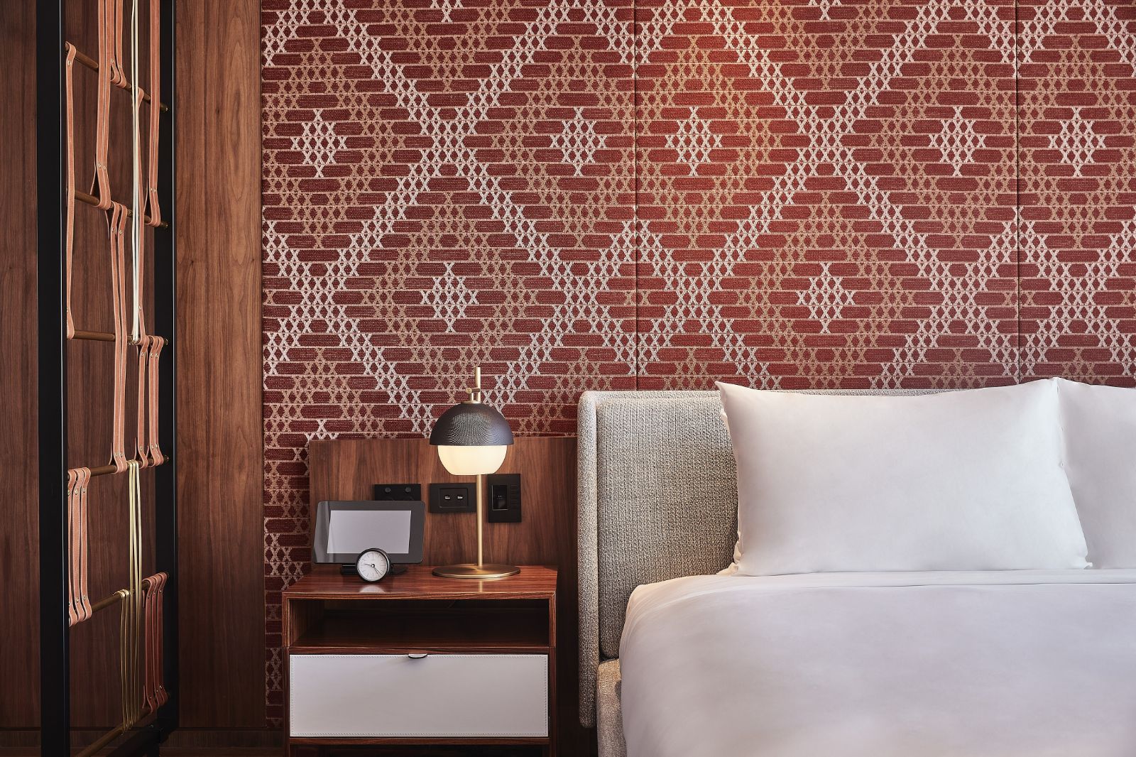 Guest suite bed and bedside table at Park Hyatt Auckland in New Zealand