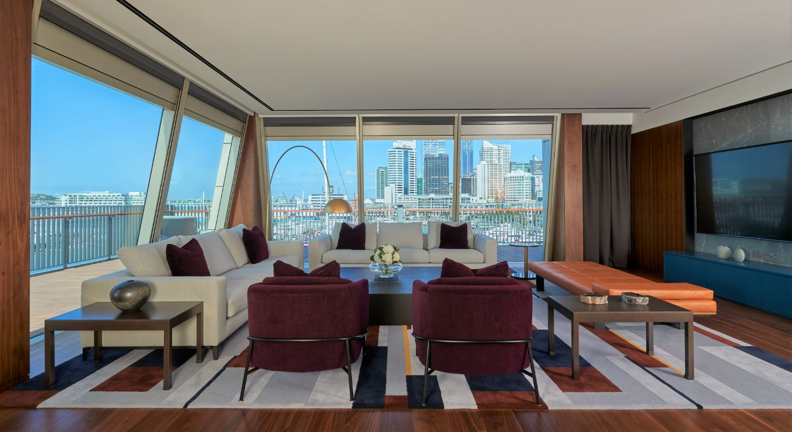 Guest suite lounge area with city view at Park Hyatt Auckland in New Zealand
