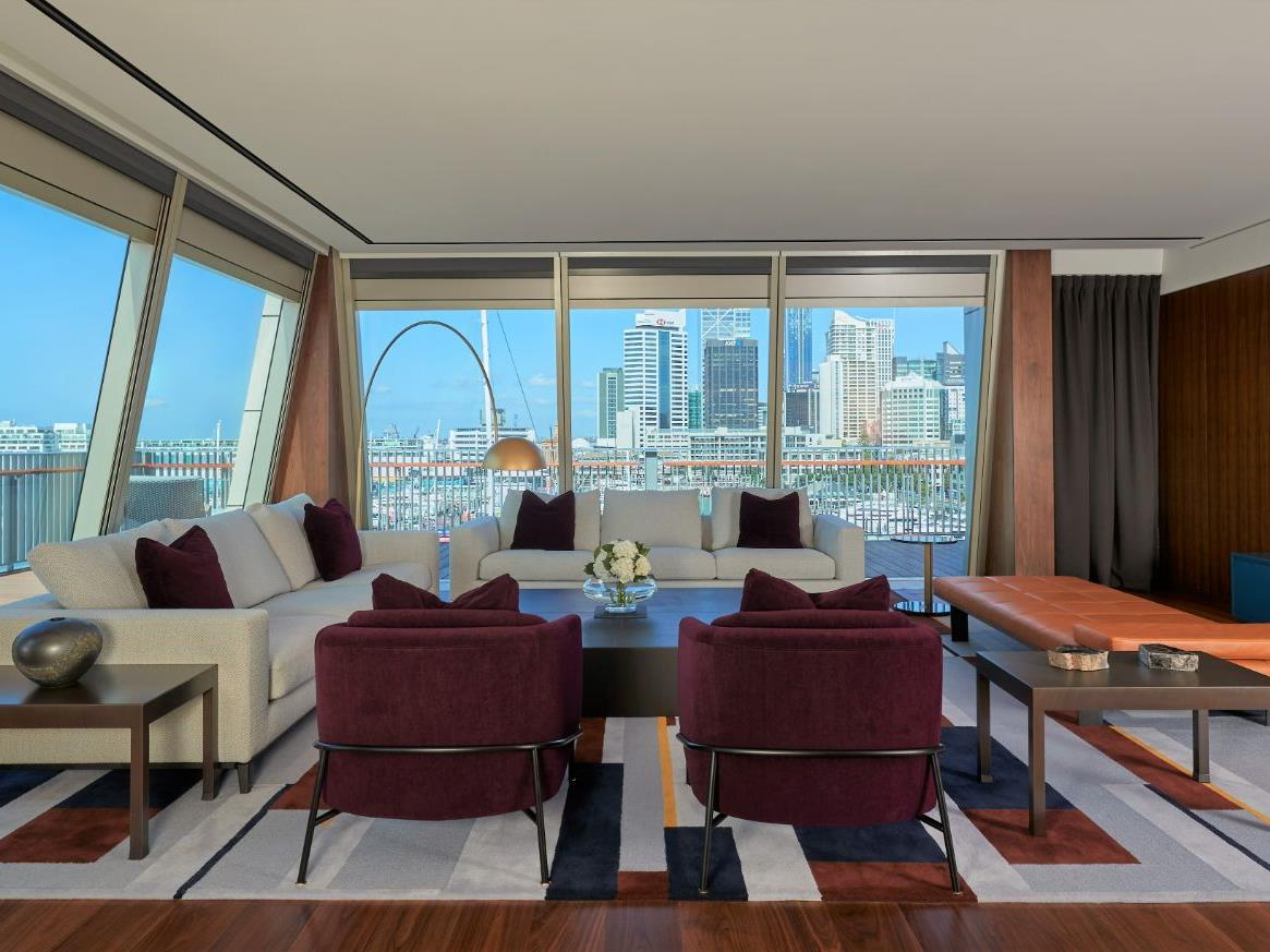 Guest suite lounge area with city view at Park Hyatt Auckland in New Zealand