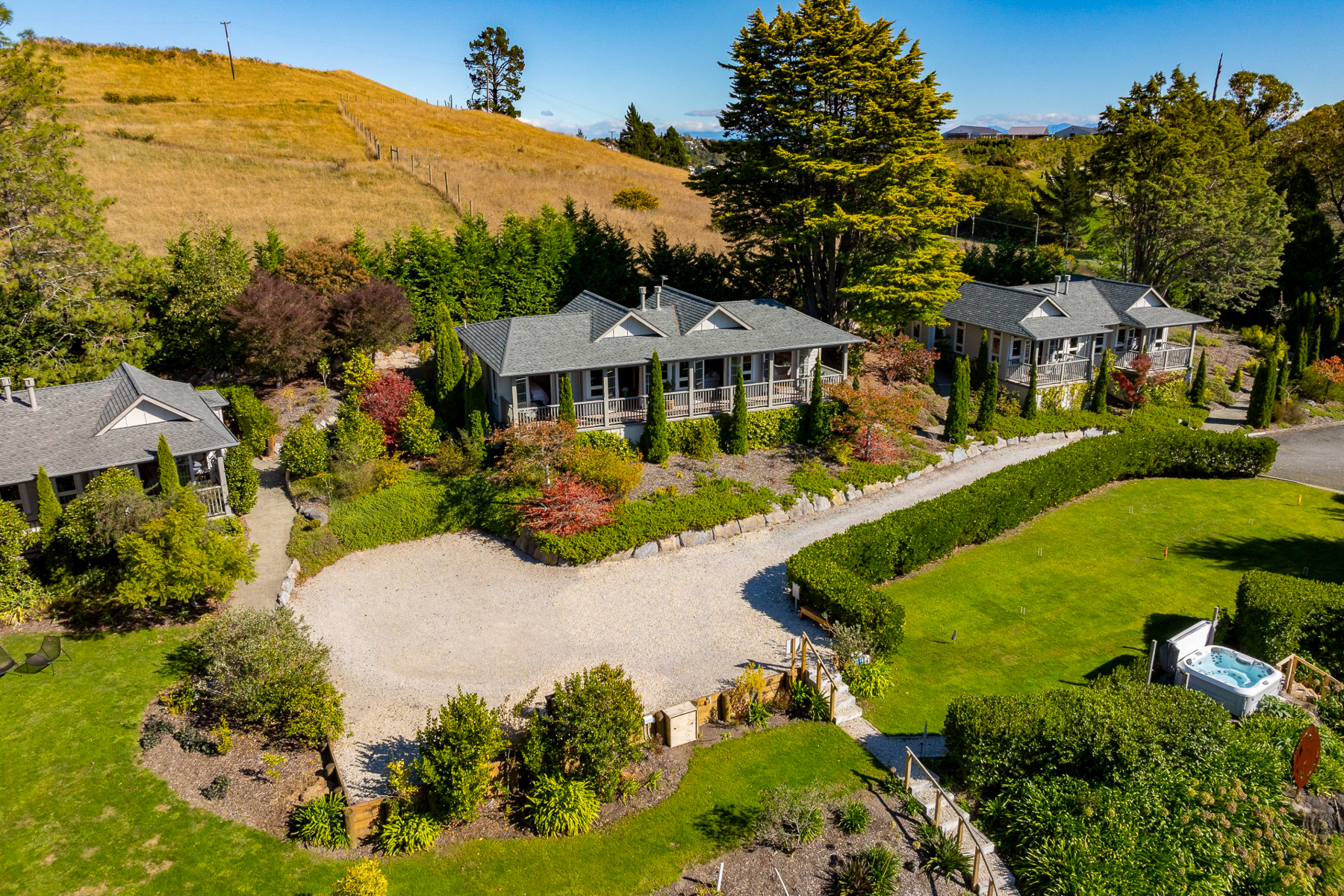 Suite exteriors and gardens at Pihopa Retreat in Nelson, New Zealand