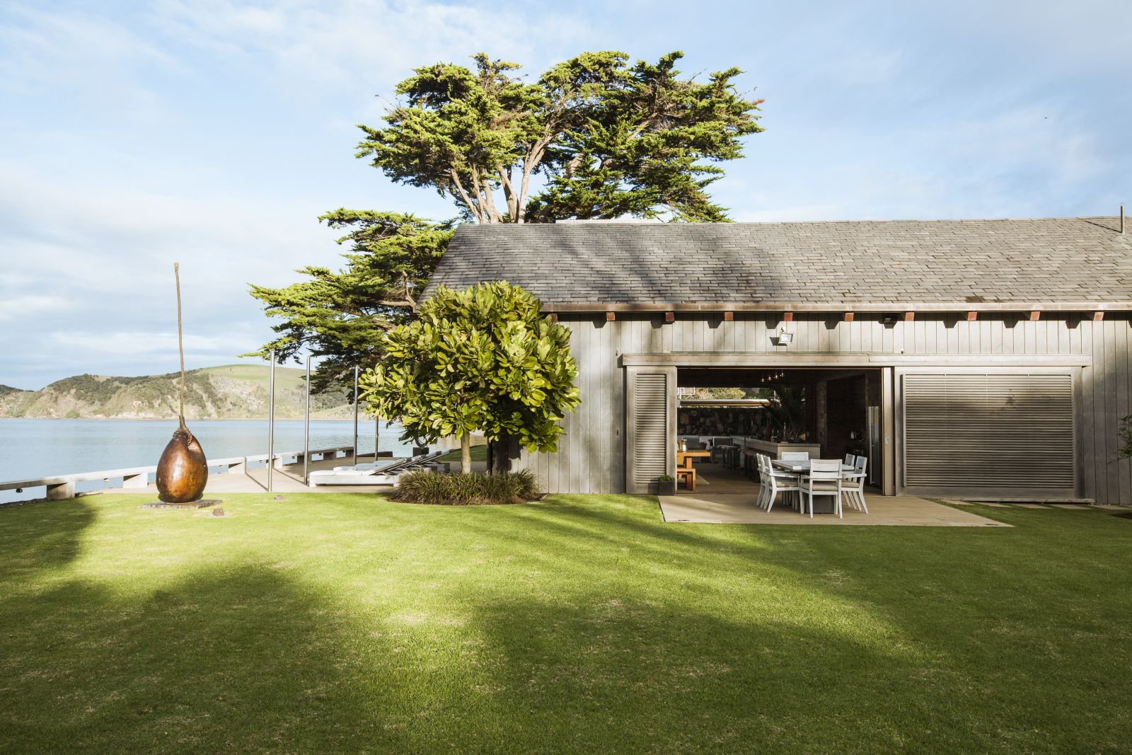 The Landing New Zealand The Boathouse outdoor dining area on the lawn 