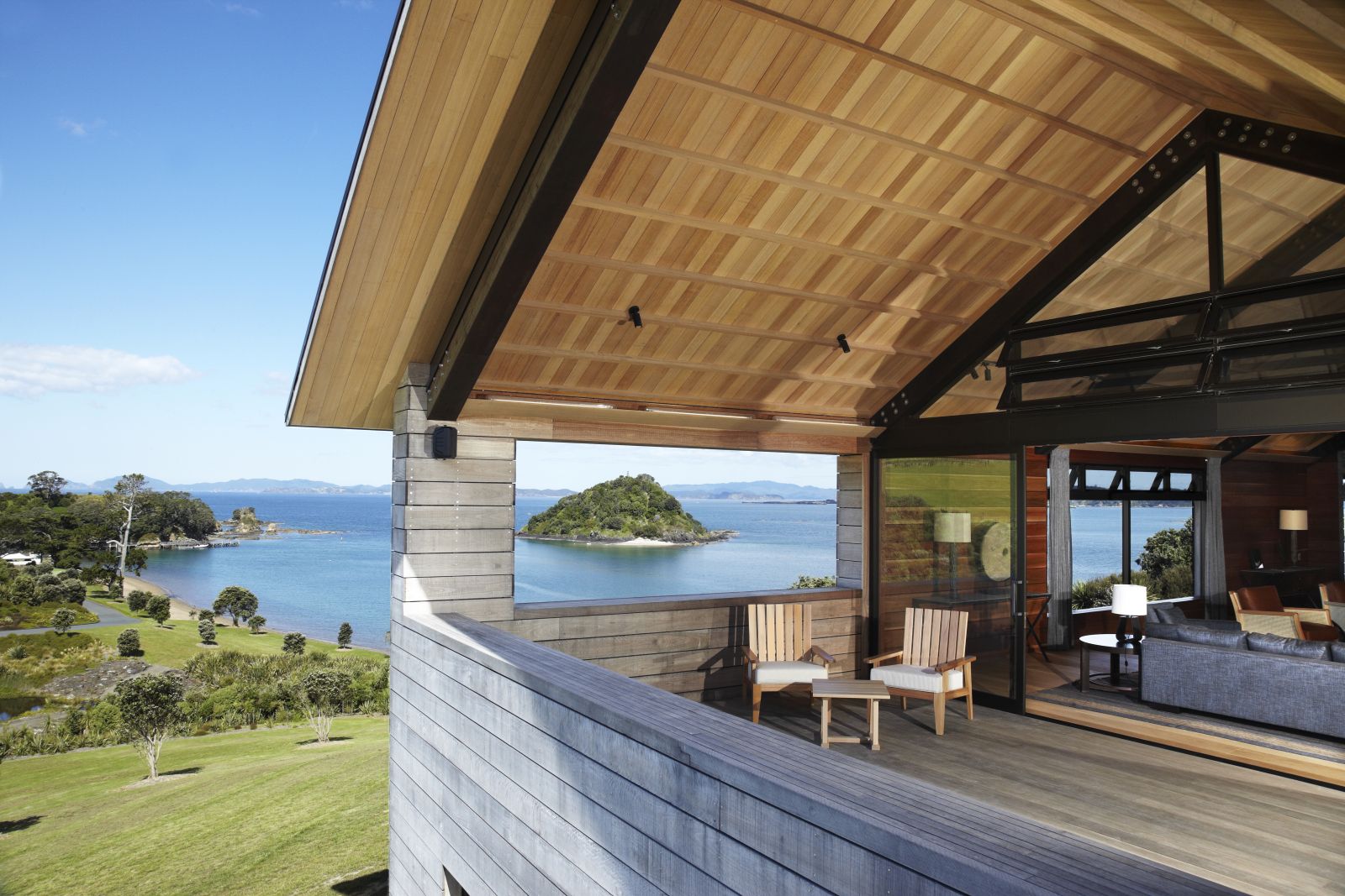 The Landing New Zealand The Gabriel balcony seating with views over the bay and hills
