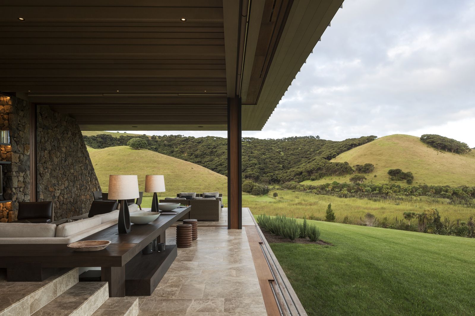 The Landing New Zealand The Vineyard The Landing New Zealand The Vineyard outdoor living area with sofas and hill views