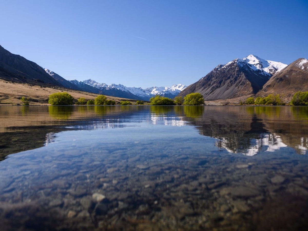 View of the Ahuiri River with mountains either side at The Lindis Lodge in New Zealand