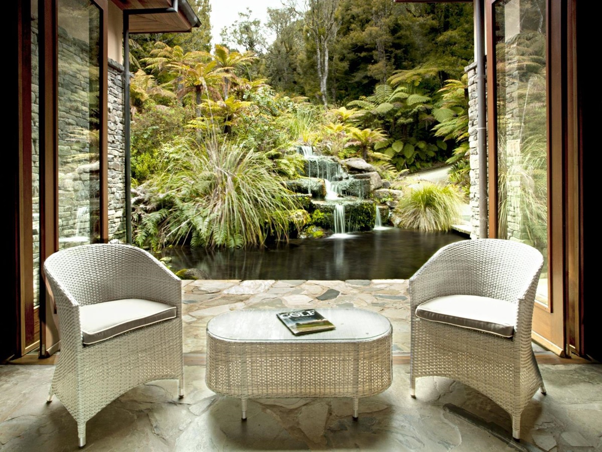 Great Room waterfall vie w at Treetops Lodge & Estate in Rotorua, New Zealand