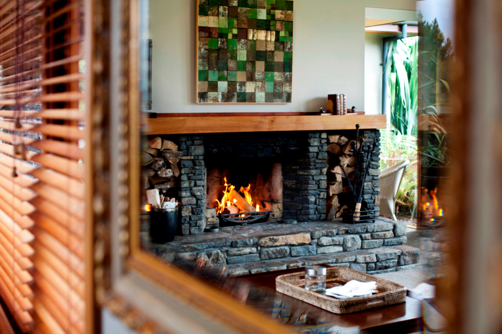 Valley Villa fireplace area at Treetops Lodge & Estate in Rotorua, New Zealand