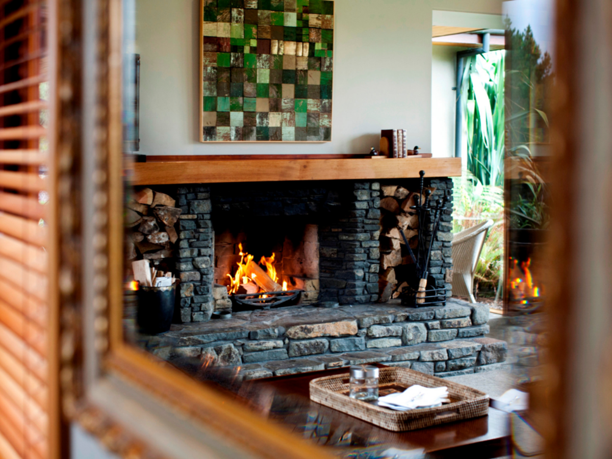 Valley Villa fireplace area at Treetops Lodge & Estate in Rotorua, New Zealand