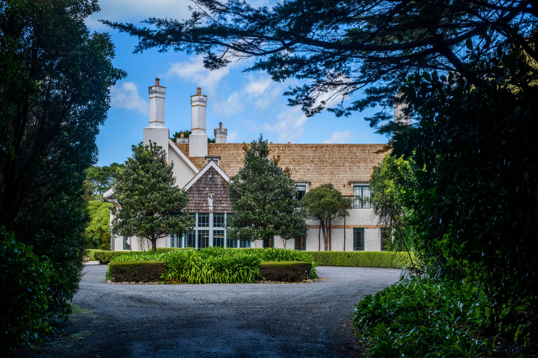 Exterior view of Wherekauhau Lodge overlooking Palliser Bay
