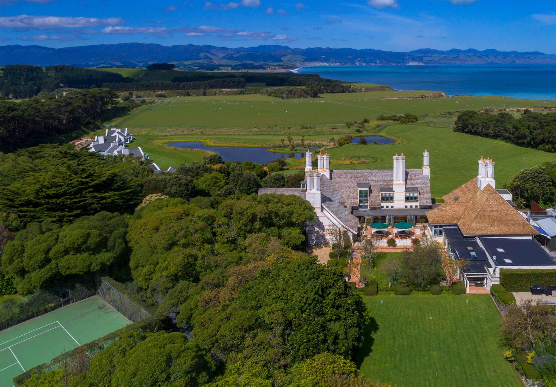 Aerial view of Wharekauhau Lodge overlooking Palliser Bay