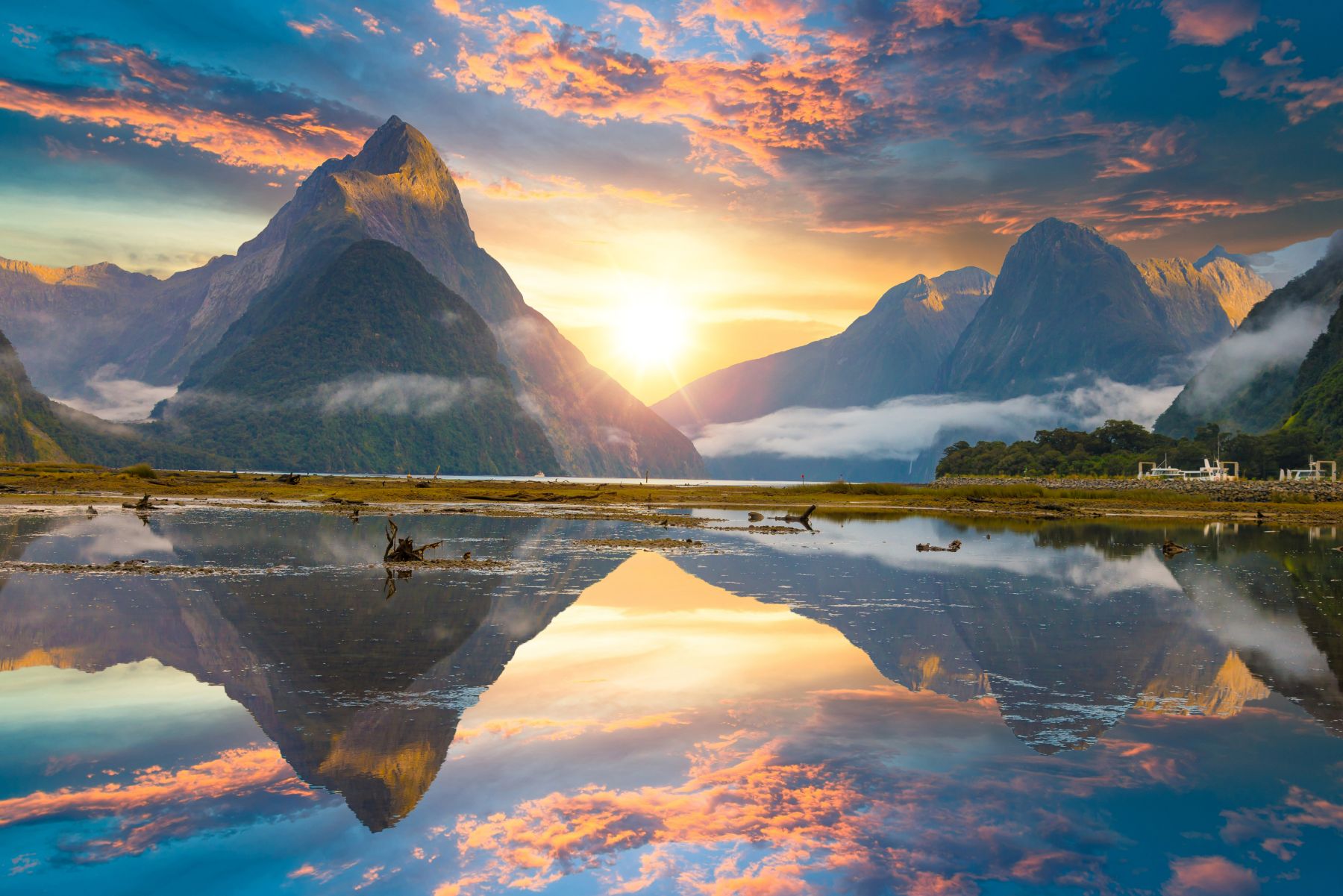 Reflections on the water of Milford Sound in New Zealand