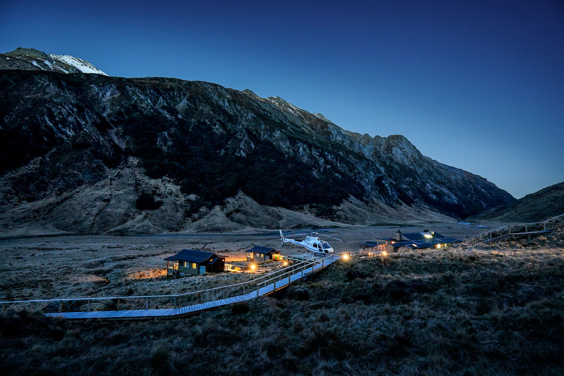 A helicopter landing at Minaret Station in New Zealand