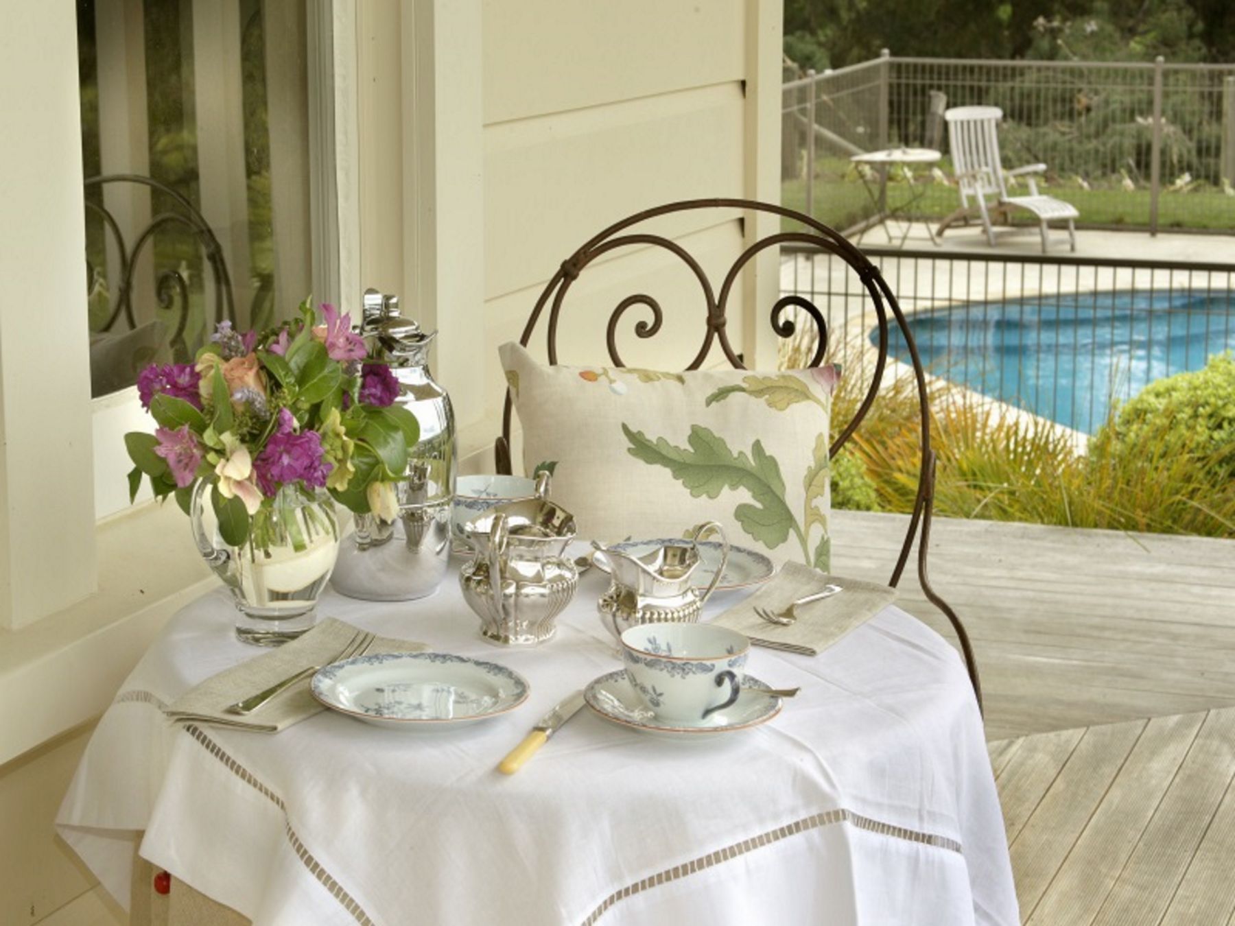 A veranda and swimming pool at The Manse in New Zealand