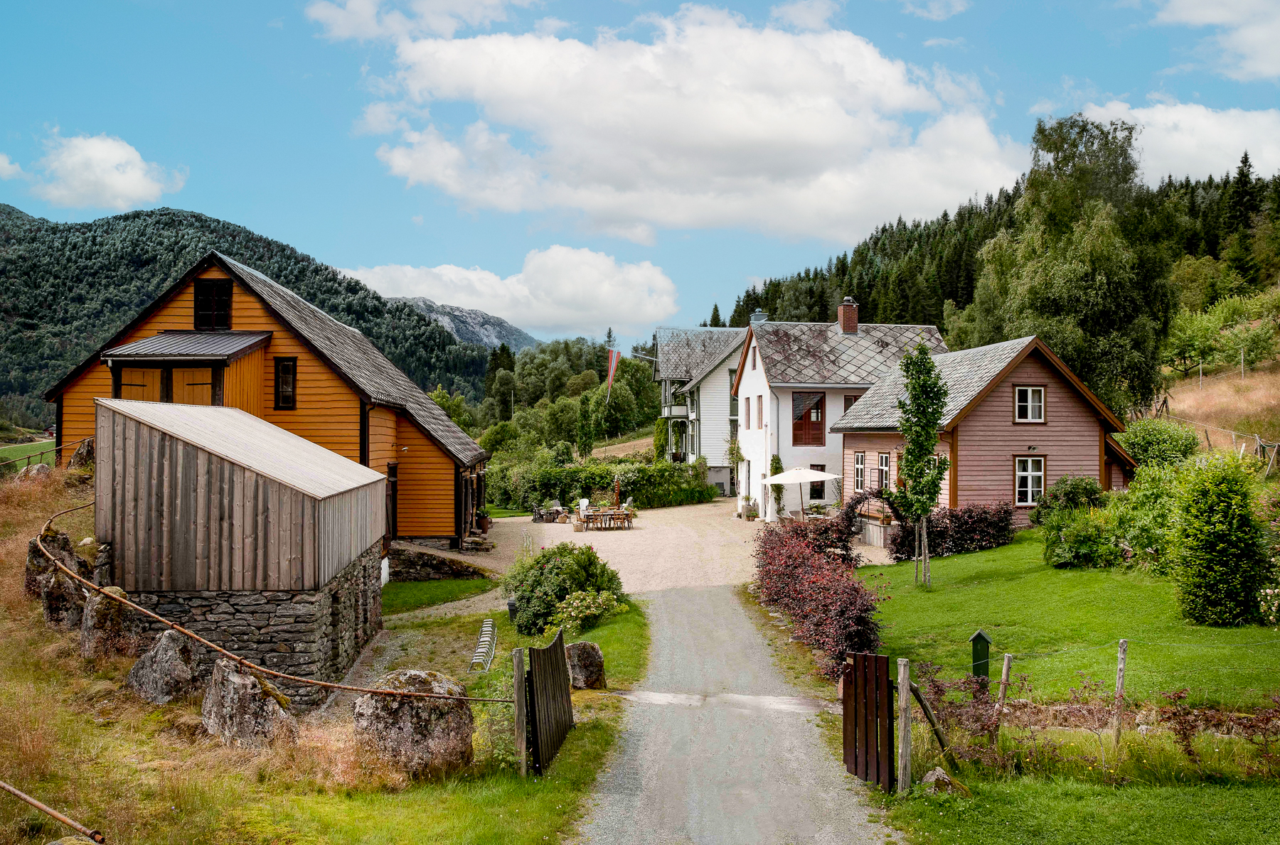 Exterior view of the courtyard and main building at Amot in Norway