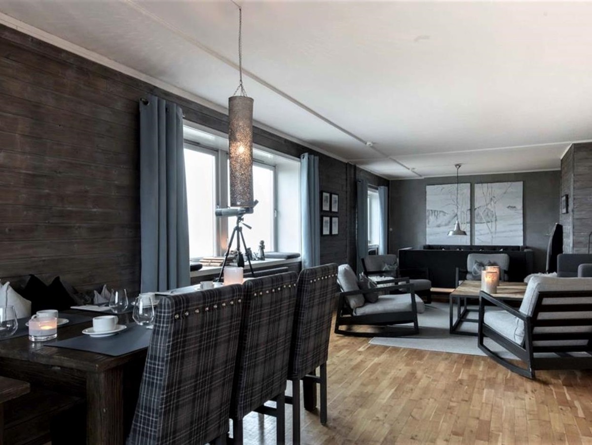Dining and lounge area at Basecamp Isfjord Radio Adventure Hotel in Svalbard Norway
