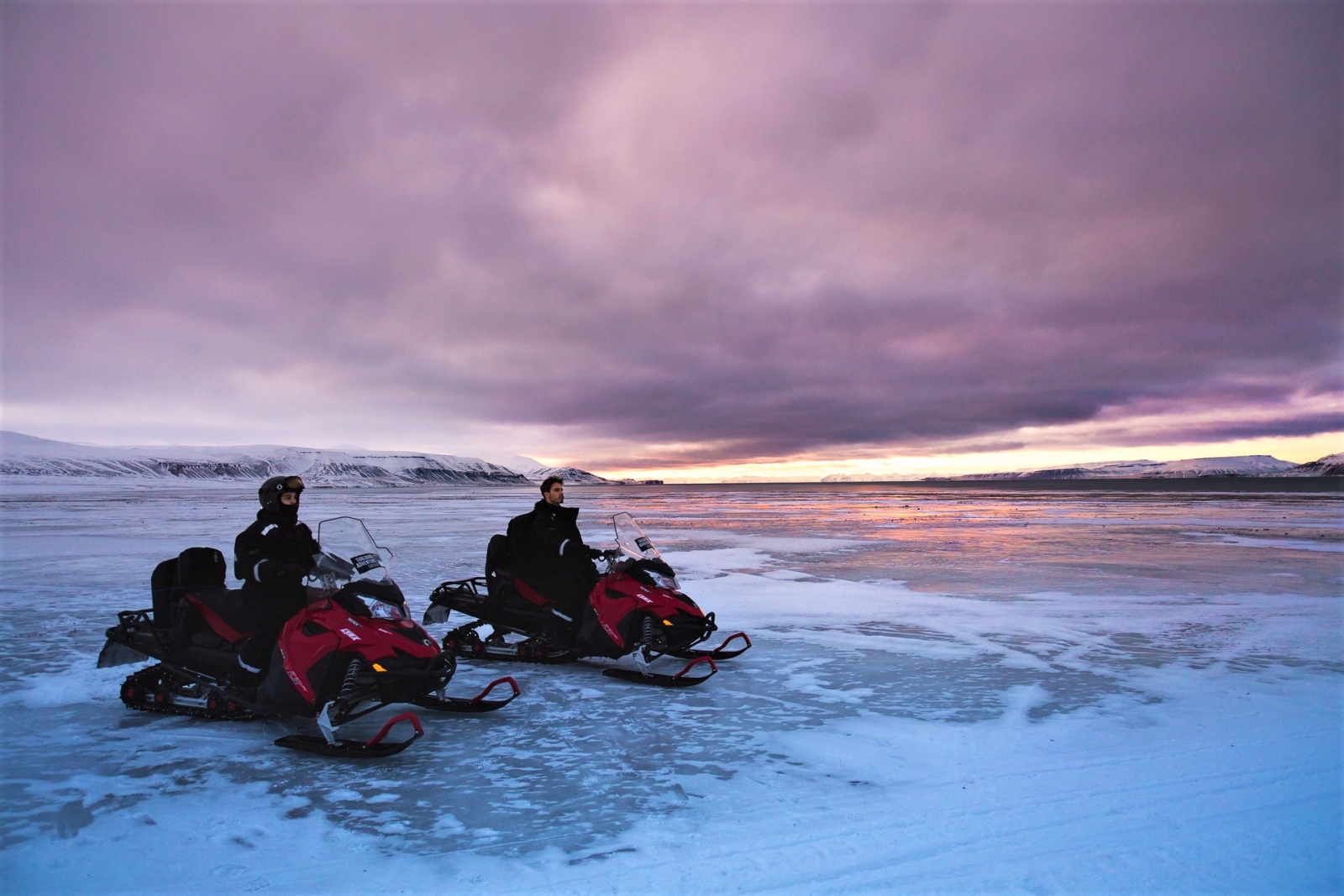 Snow mobile adventures at Basecamp Isfjord Radio Adventure Hotel in Svalbard Norway