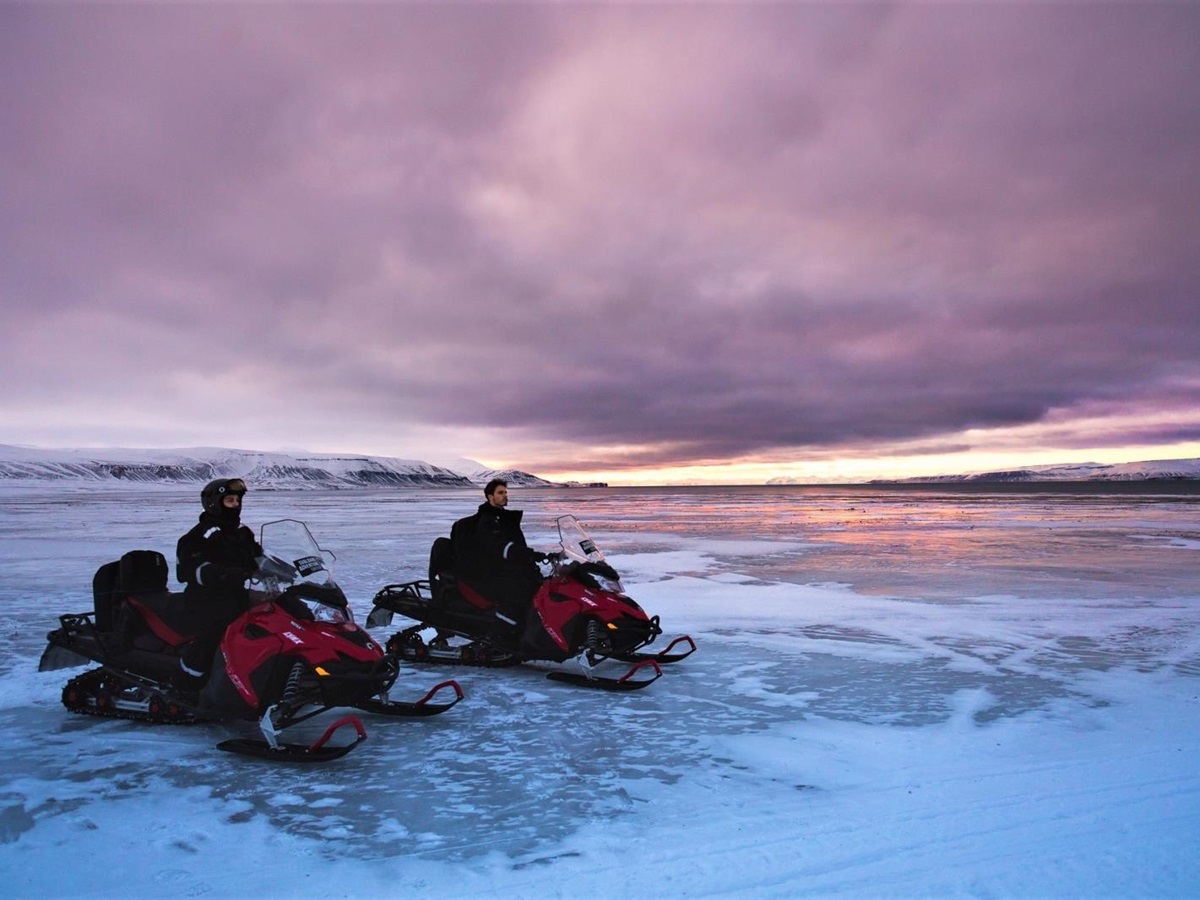 Snow mobile adventures at Basecamp Isfjord Radio Adventure Hotel in Svalbard Norway
