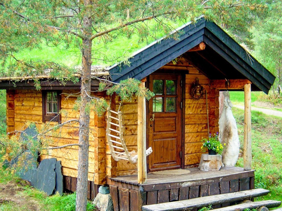 Facade of a guest cabin at Engholm Husky Design Lodge in Norway