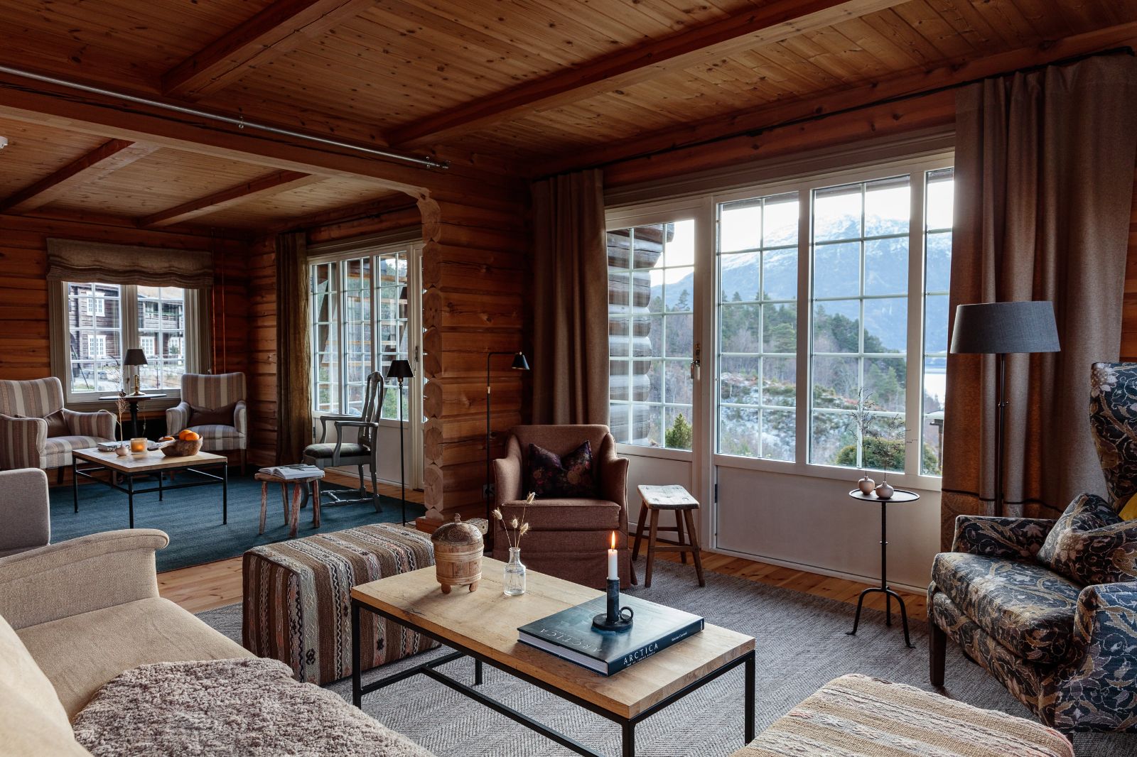 Living Room of Wood Cabin with Mountain View at Luxury Norwegian Hotel Storfjord Hotel
