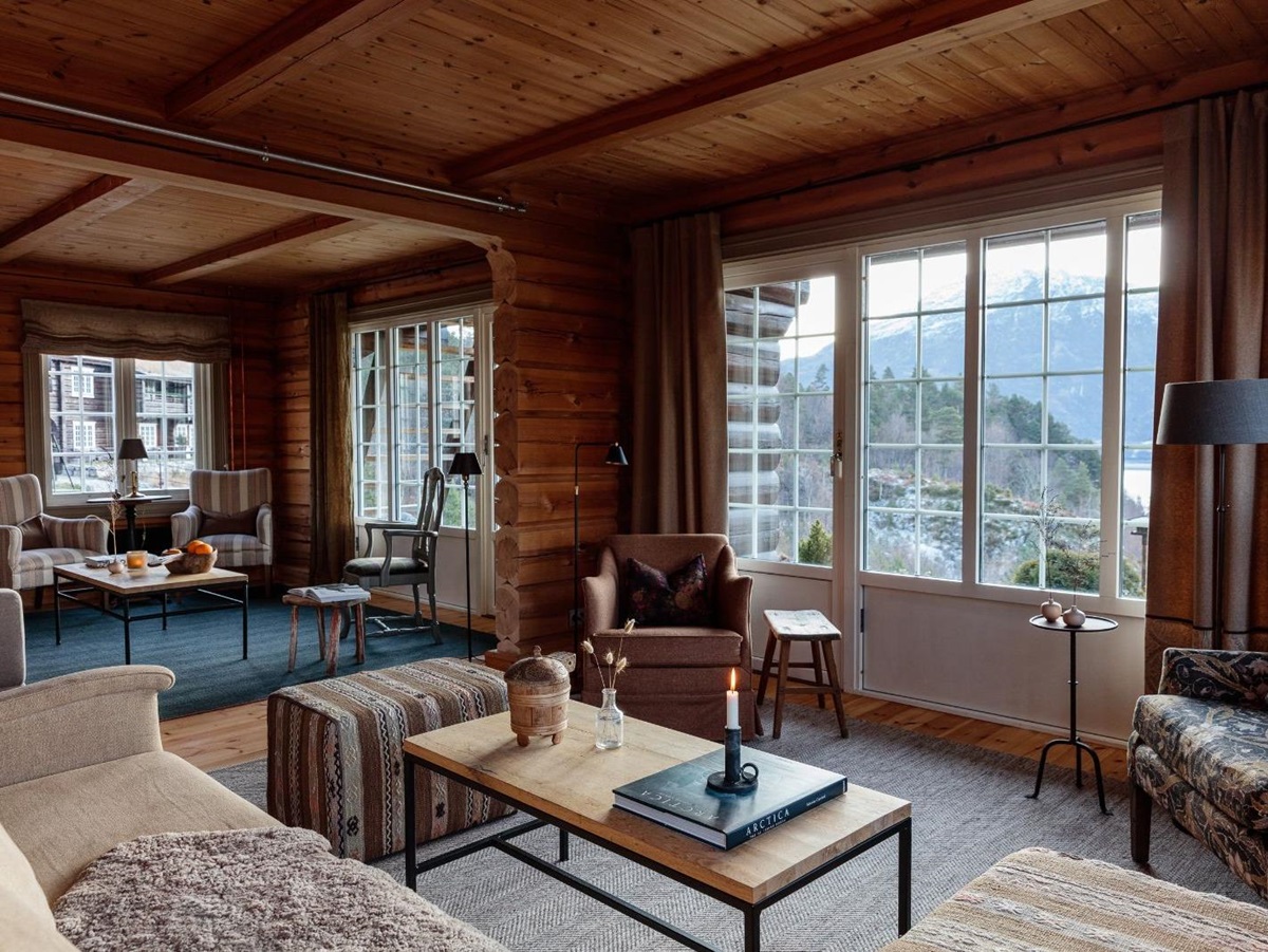 Living Room of Wood Cabin with Mountain View at Luxury Norwegian Hotel Storfjord Hotel