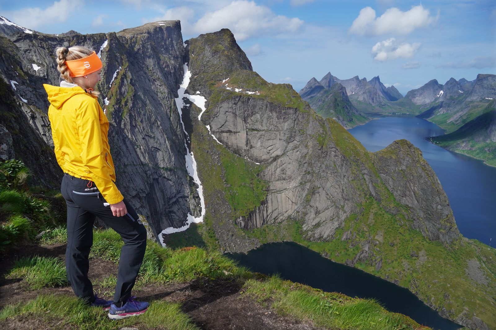 A woman hiking in the mountains around the Lofoten Islands (Credit Christine Baglo-VisitNorway)