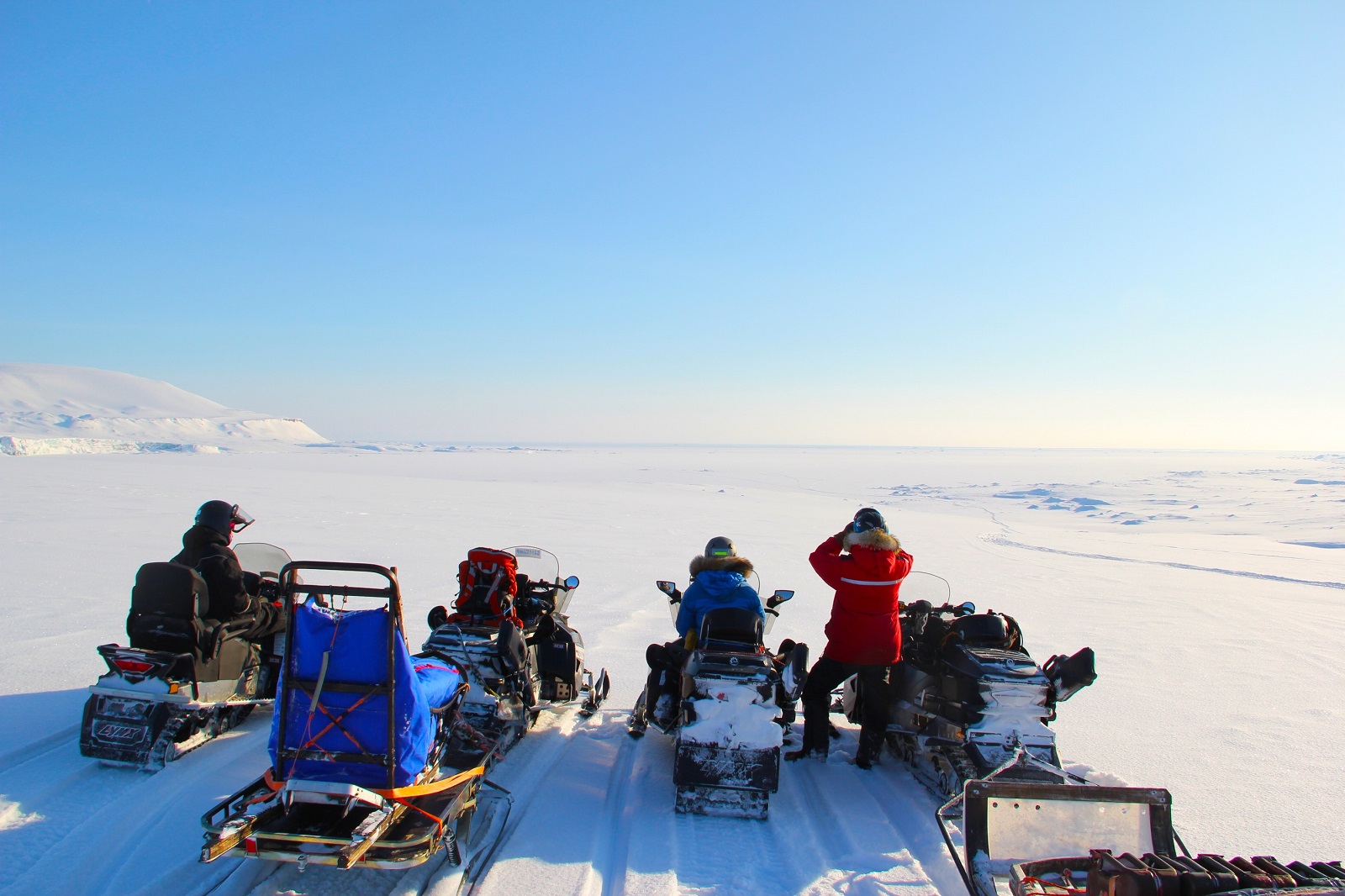 Snowmobiles near basecamp in Norway