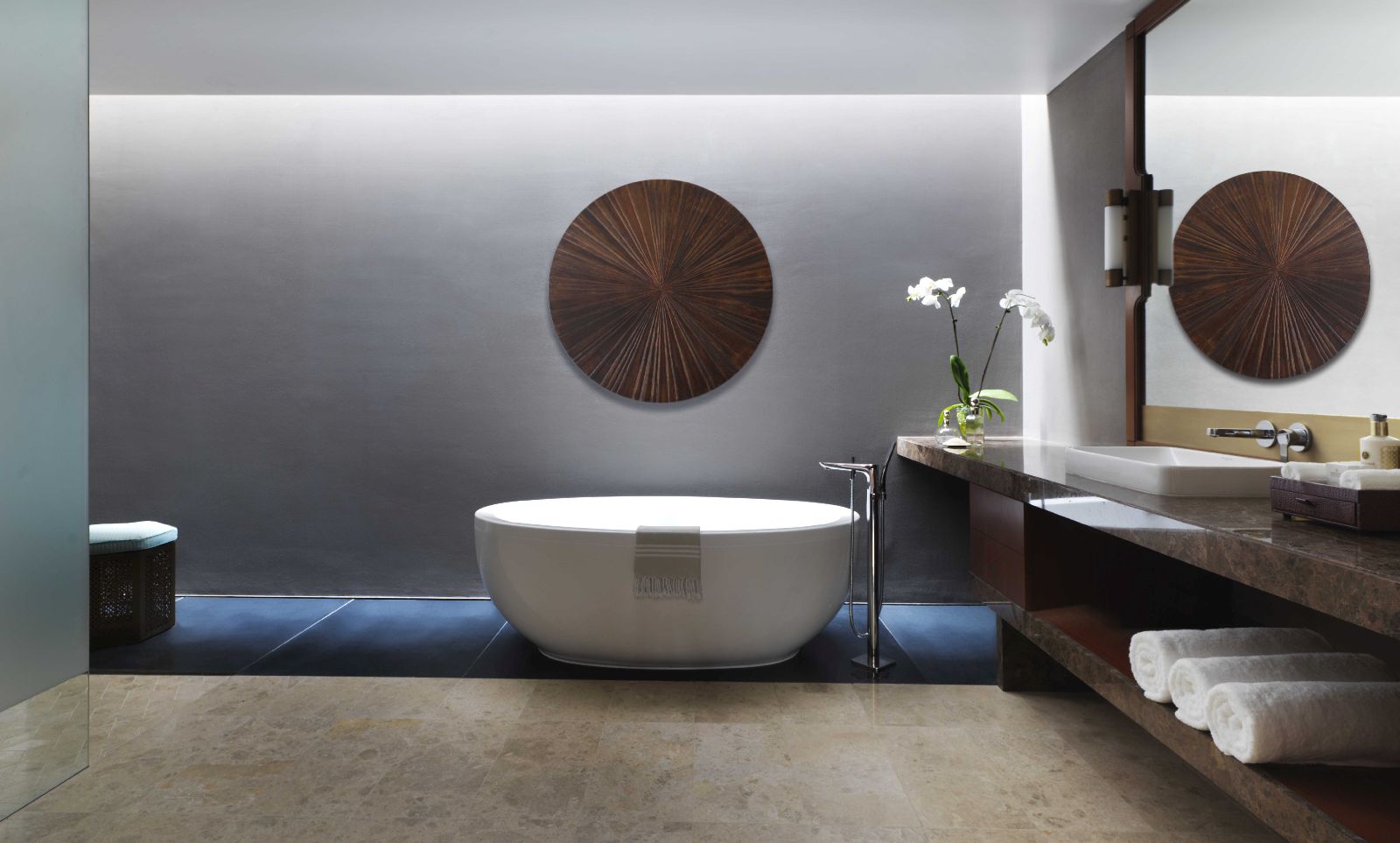 Luxurious bathroom of a guest room at the Al Baleed Salalah by Anantara resort in Oman