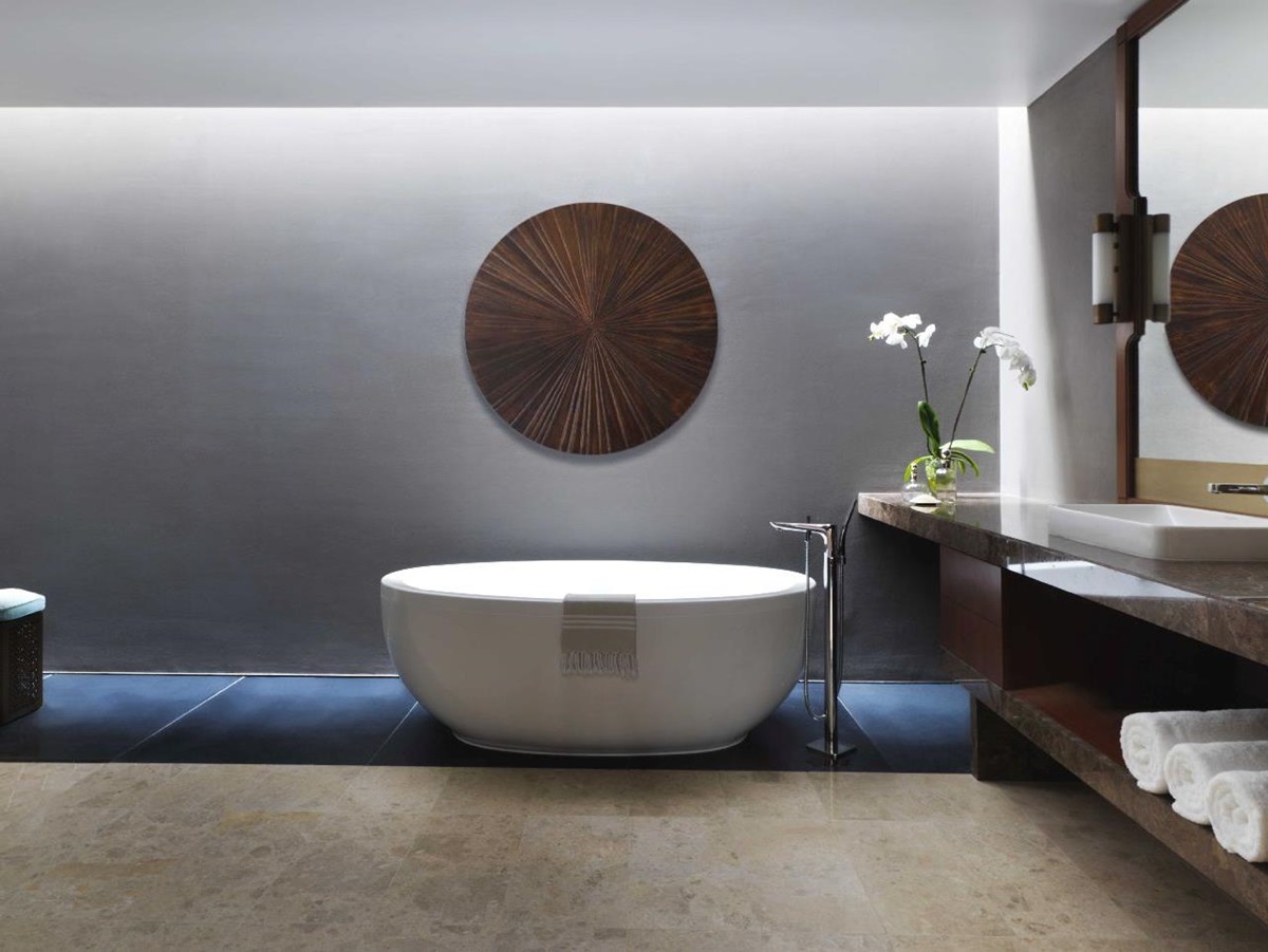 Luxurious bathroom of a guest room at the Al Baleed Salalah by Anantara resort in Oman