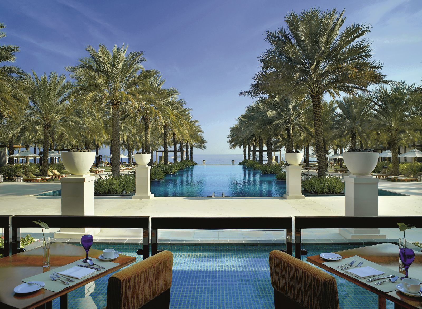 Sea view pool and terrace at the Al Bustan Palace Muscat Oman