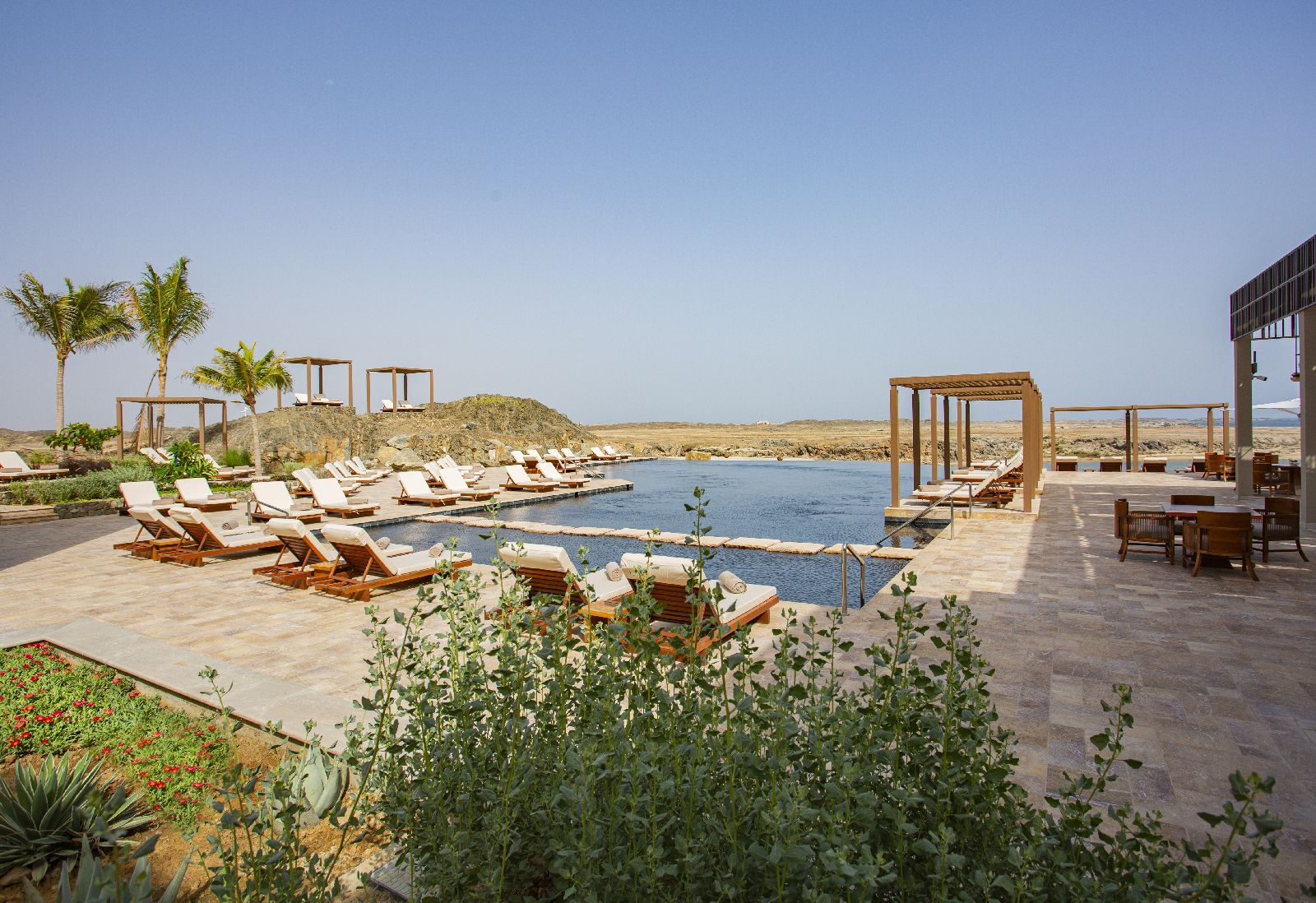 Pool and sun terrace at Alila Hinu Bay in Oman