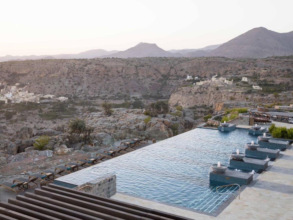 The cliff top pool with views of the surrounding mountains at the Anantara Al Jabal Al Akhdar Resort in Oman