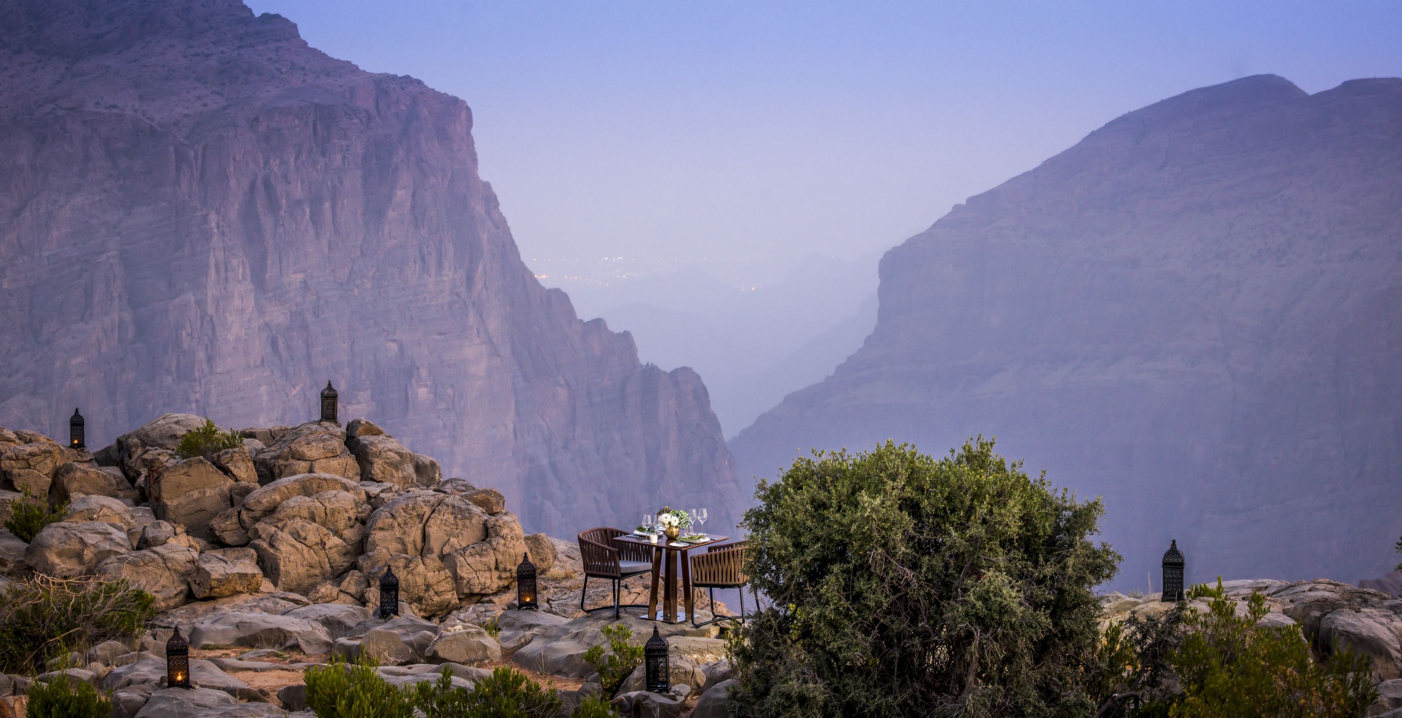 Outdoor dining with mountainous backdrop form Anantara Al Jabal Al Akhdar Resort, Oman