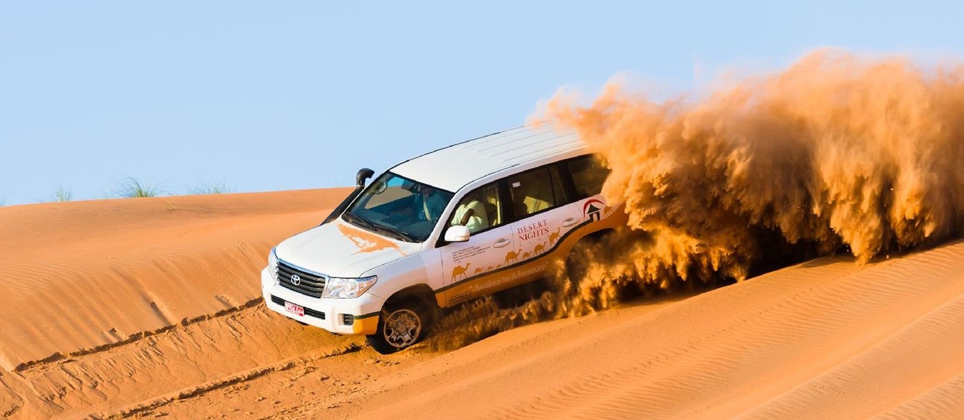 Driving through the dunes to Desert Nights Camp Oman