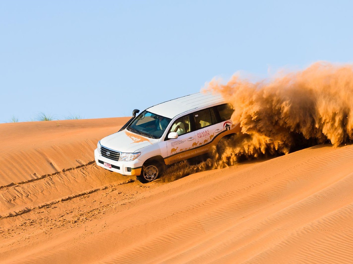 Driving through the dunes to Desert Nights Camp Oman