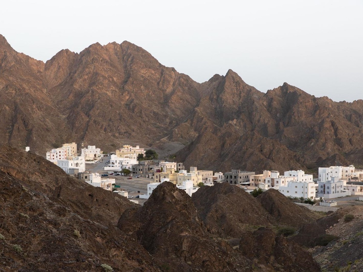 Distant view of the Jumeirah Muscat Bay in Oman surrounded by mountains