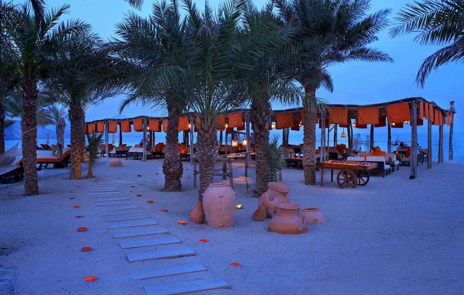 Beachfront dining at the Six Senses Zighy Bay Oman