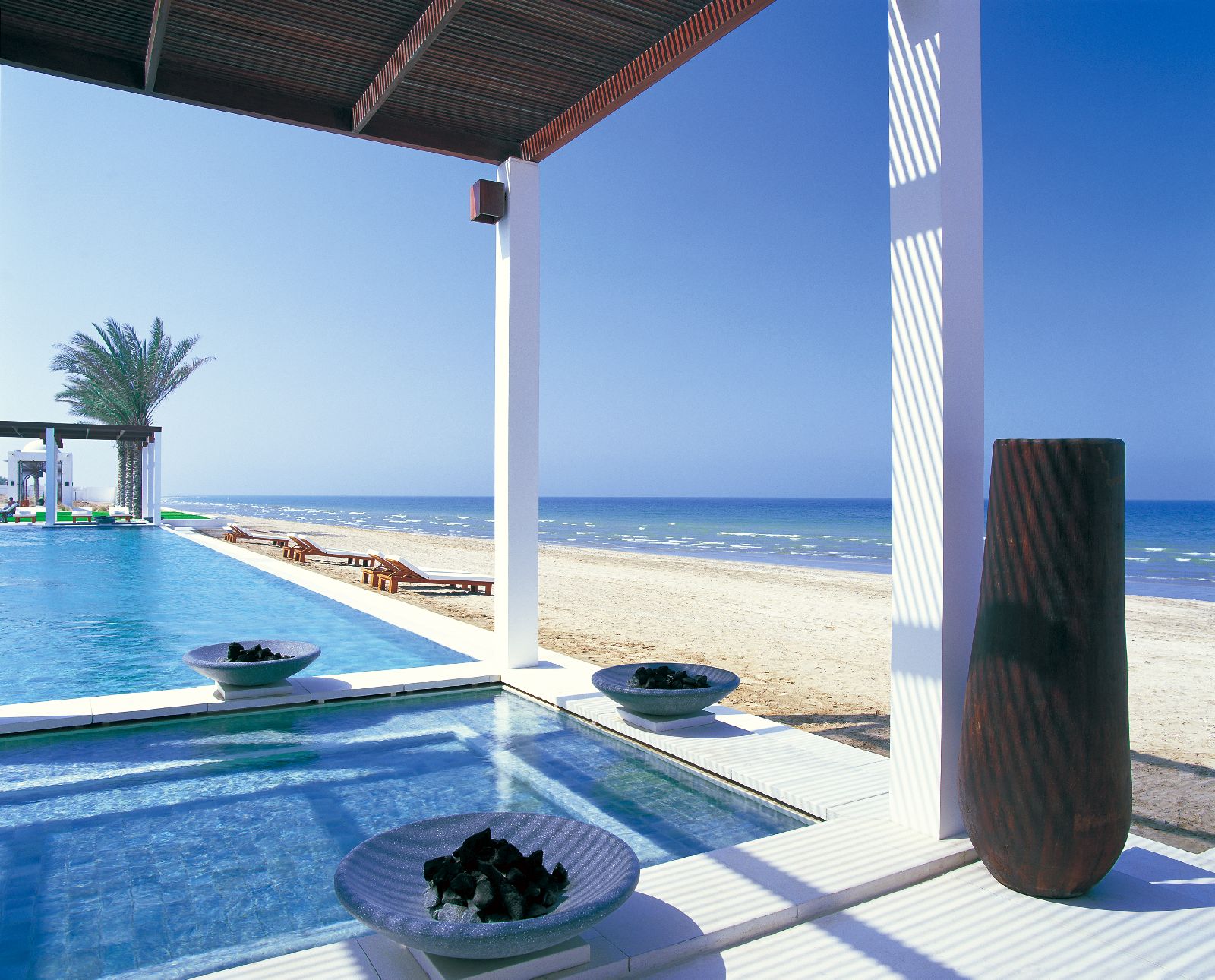 Swimming pool and beach at the Chedi Muscat in Oman